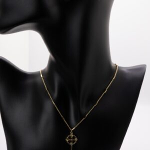 Set dorado con dije de llave